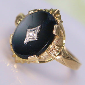 Vintage onyx and diamond ring in yellow gold