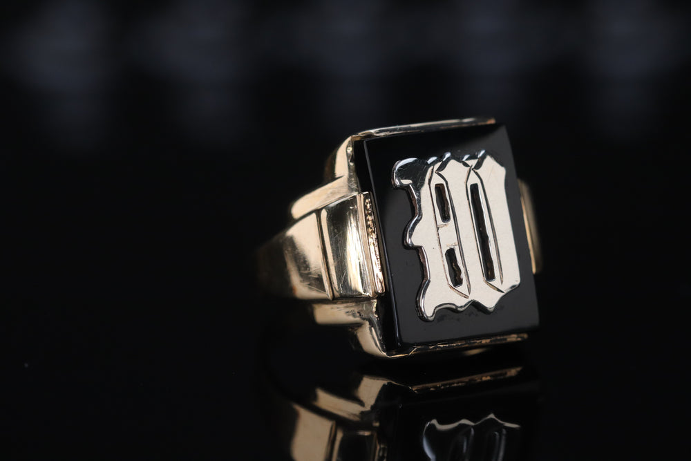 Vintage onyx ring with initial W in yellow gold