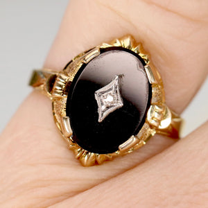 Vintage onyx and diamond ring in yellow gold