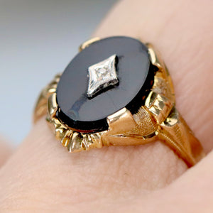 Vintage onyx and diamond ring in yellow gold