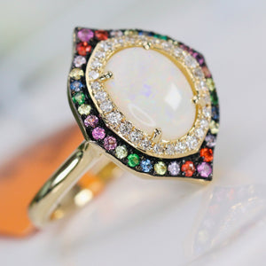 Opal, sapphire, tsavorite, and diamond ring in 14k yellow gold by Effy