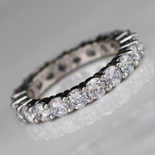 Load image into Gallery viewer, Sterling silver CZ medium eternity band