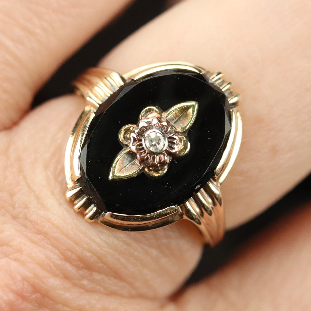 Classic vintage onyx and diamond ring in 14k yellow gold