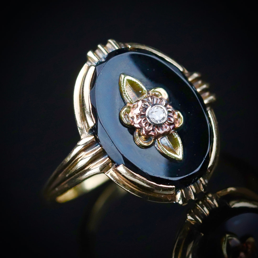 Classic vintage onyx and diamond ring in 14k yellow gold