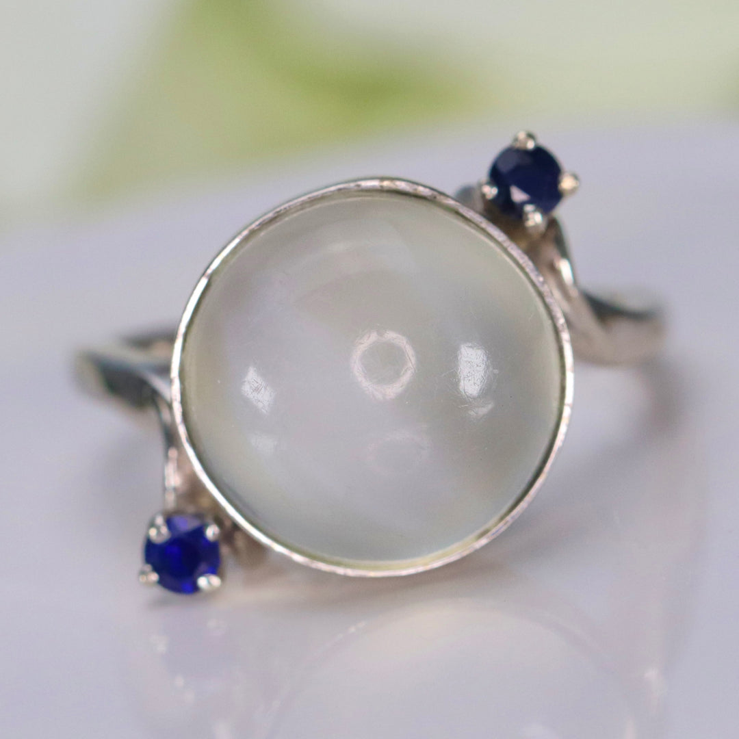 Vintage ring with moonstone and synthetic sapphires in 14k white gold