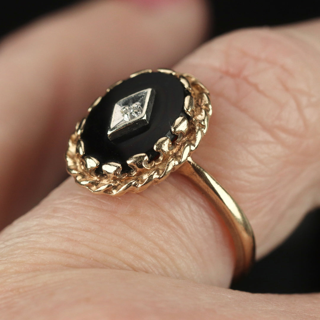 Vintage onyx and diamond ring in yellow gold from Manor Jewels