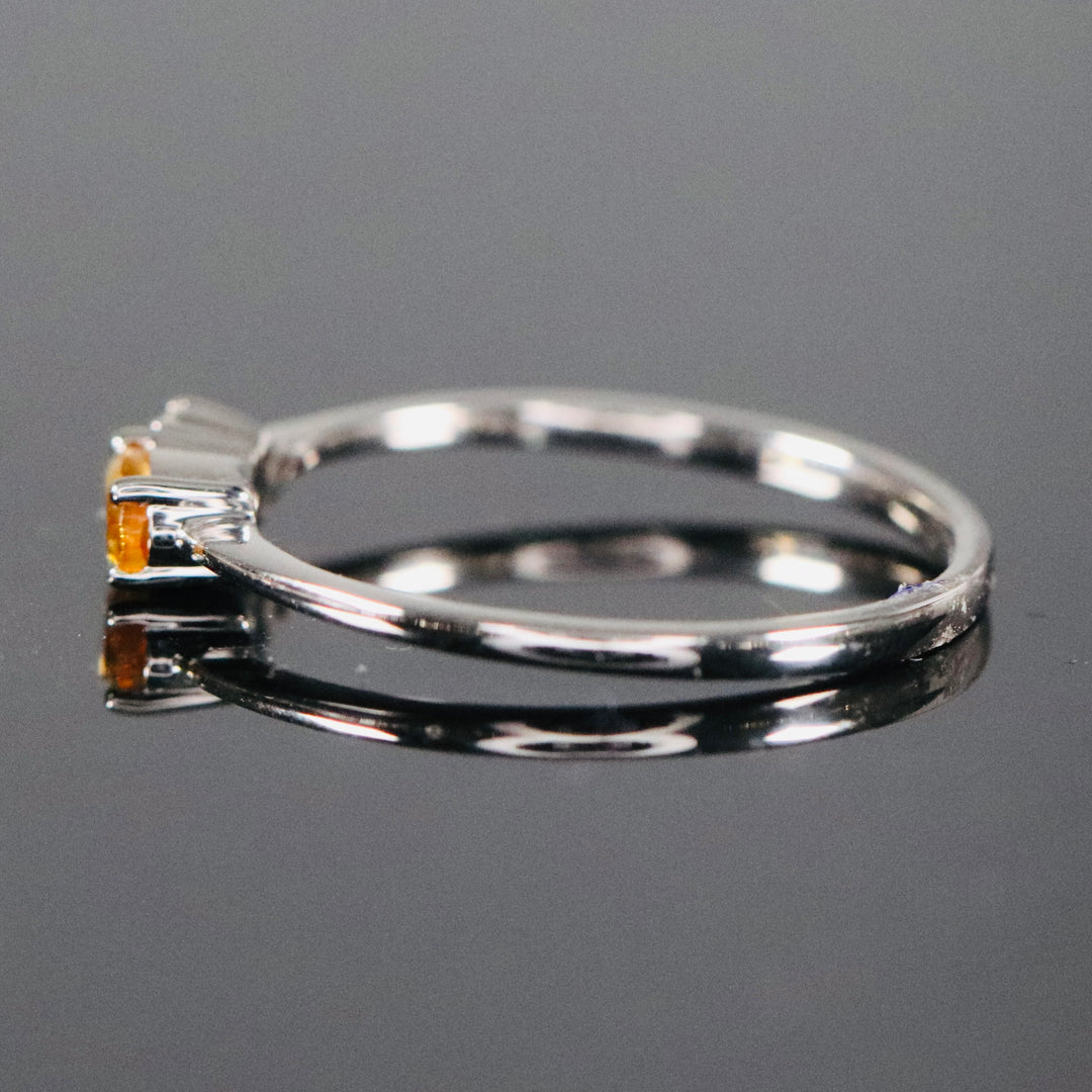 Citrine and diamond ring in white gold