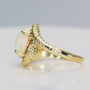 Estate Opal and diamond ring in yellow gold