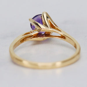 Amethyst solitaire ring in yellow gold