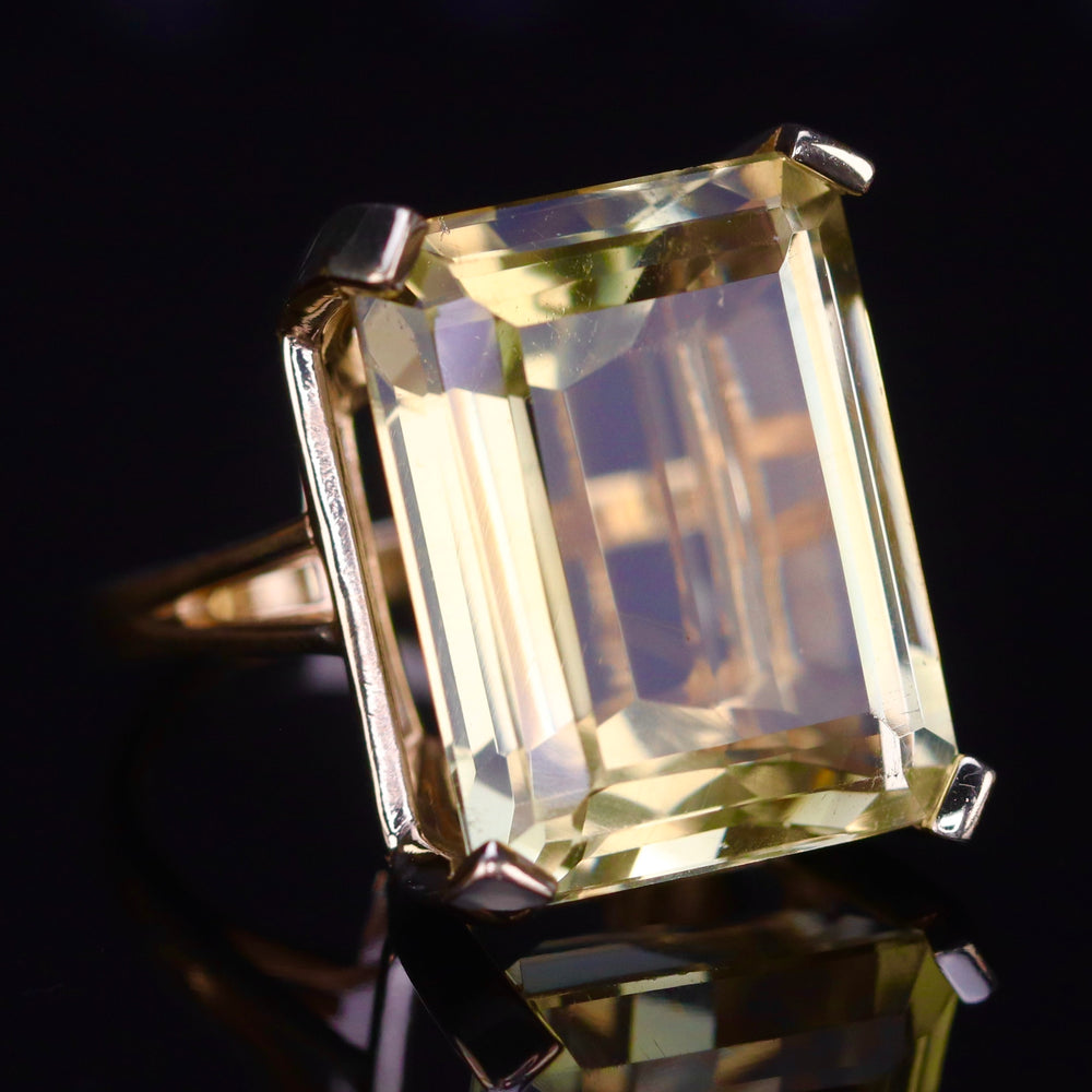 Vintage ring with a large emerald cut citrine in 14k yellow gold