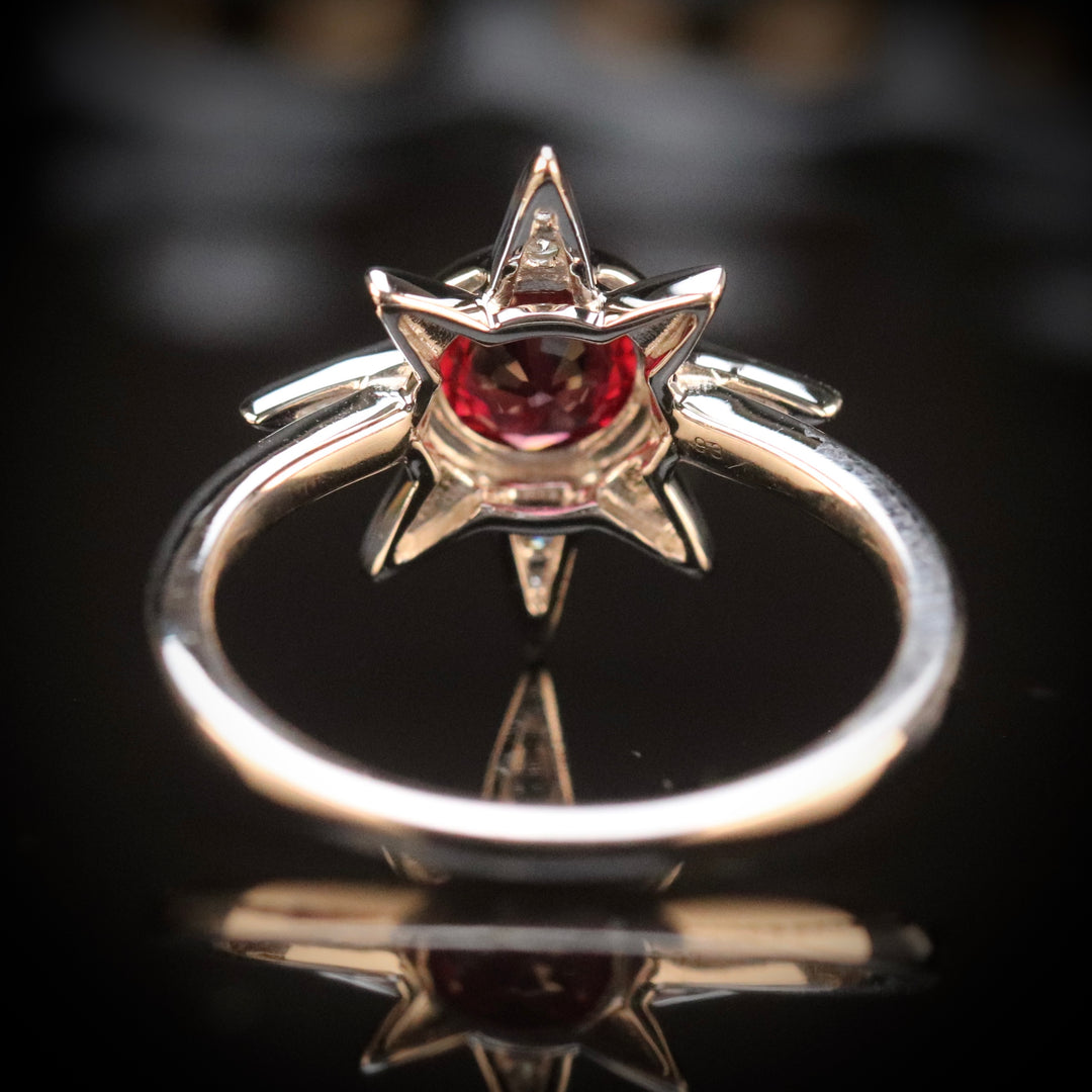 Ruby and diamond compass ring in 14k white gold from Manor Jewels