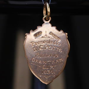 Vintage gold medal in yellow gold