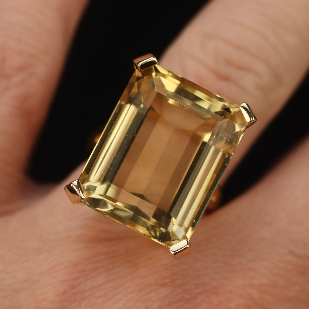 Vintage ring with a large emerald cut citrine in 14k yellow gold