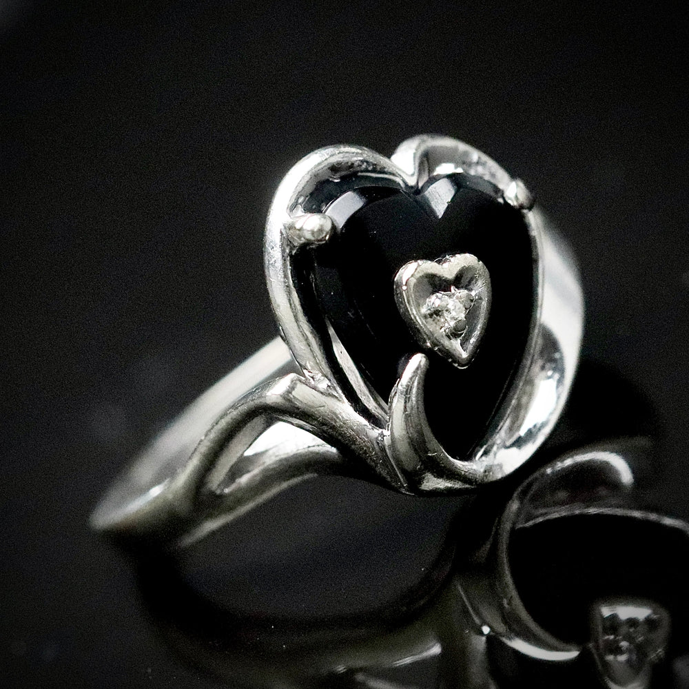 Vintage heart shaped onyx and diamond ring in white gold