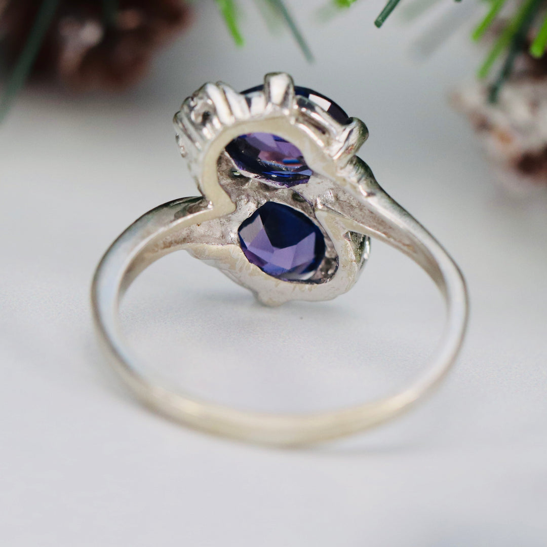 Vintage ring with synthetic purple sapphires in white gold