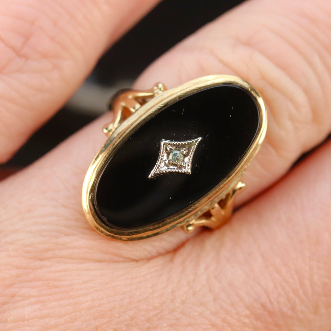Vintage large Onyx and diamond ring in yellow gold