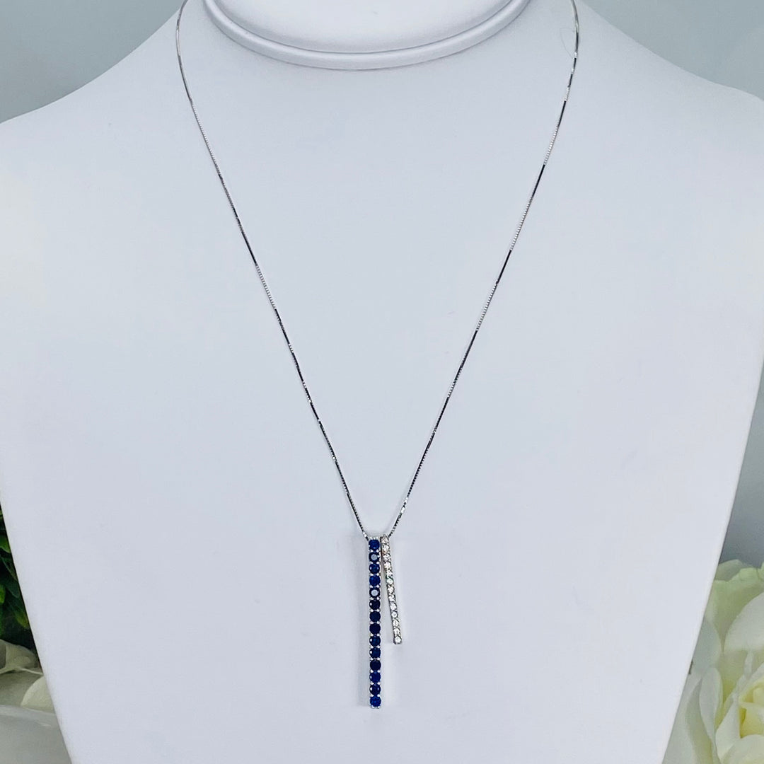 Blue and white synthetic sapphire necklace in white gold