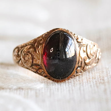 Antique garnet cabochon ring in rose gold