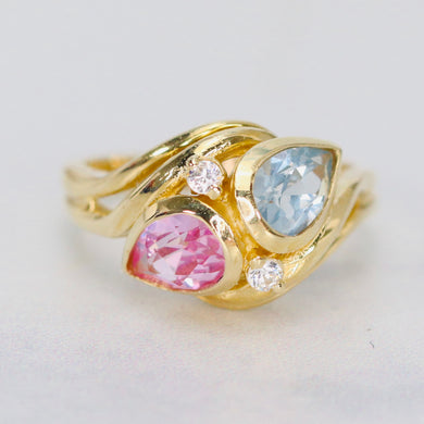 Synthetic pink sapphire and blue spinel in stunning setting of 14k gold