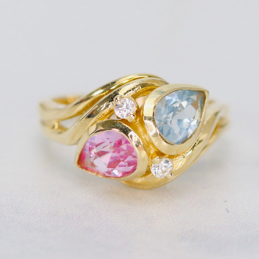 Synthetic pink sapphire and blue spinel in stunning setting of 14k gold