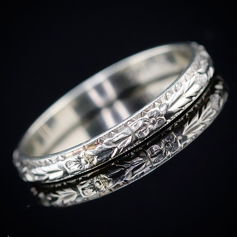 Vintage orange blossom band ring in 14k white gold from Manor Jewels.