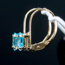 Load image into Gallery viewer, Blue topaz leverback earrings in yellow gold