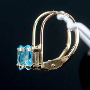 Blue topaz leverback earrings in yellow gold