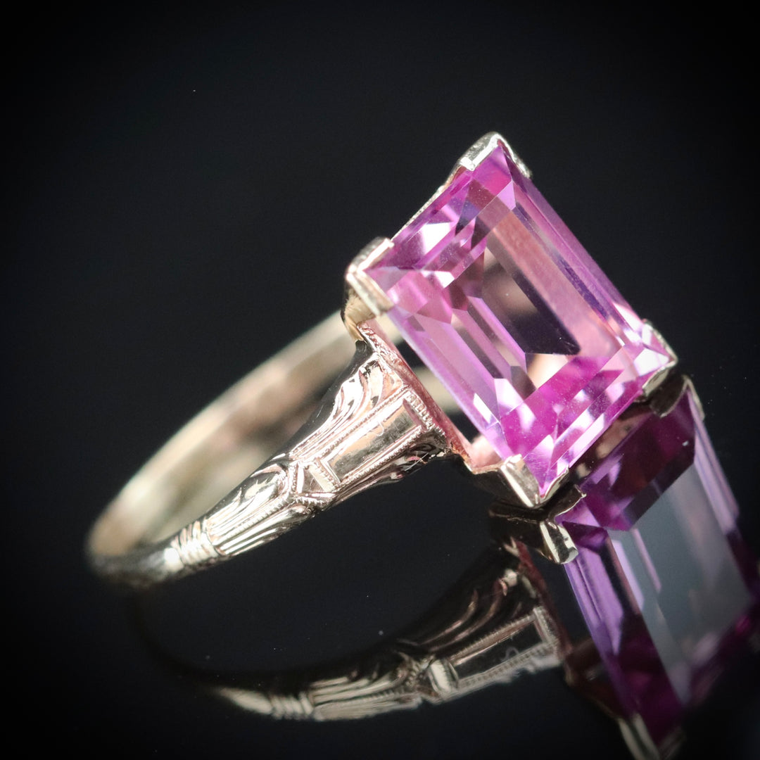 Vintage ring with synthetic pink sapphire in yellow gold from Manor Jewels.