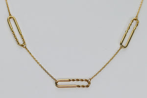 Paper clip station chain in 14k yellow gold