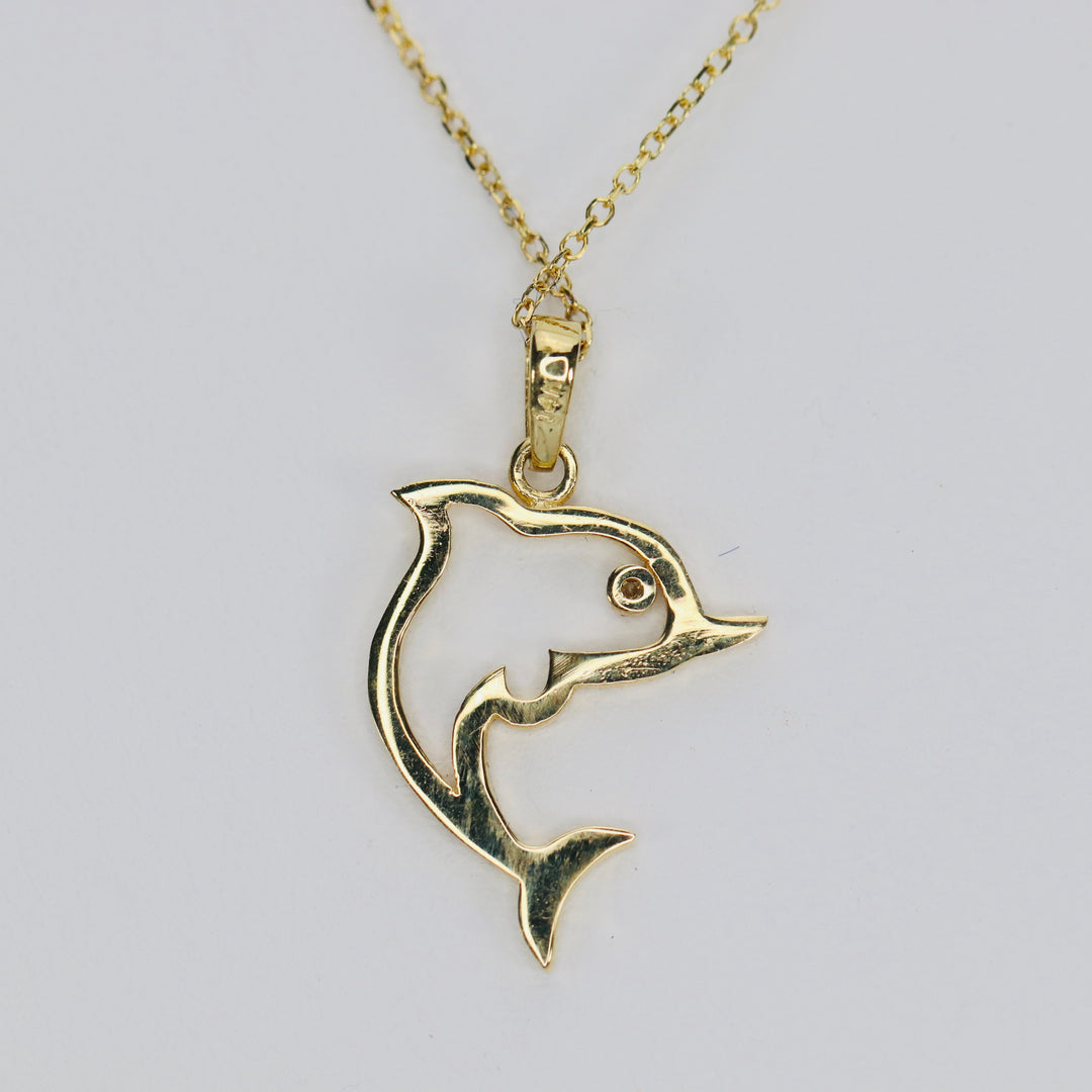 Diamond dolphin necklace in 14k yellow gold
