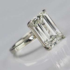 6.03ct emerald cut lab grown solitaire diamond ring in 14k white gold