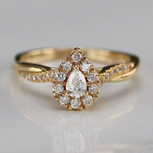 Pear shape diamond cluster ring in 14k yellow gold *onyx deal*