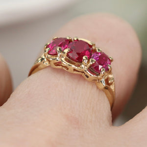 Vintage synthetic pink sapphire 3 stone ring in yellow gold