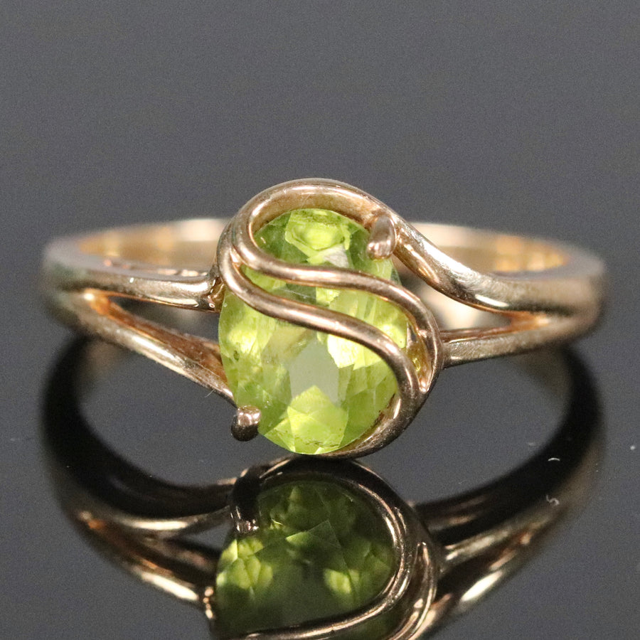 Vintage peridot ring in yellow gold by Manor Jewels