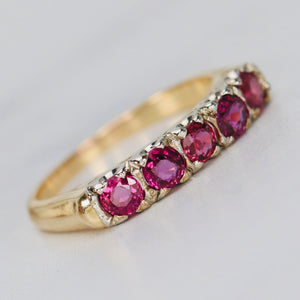 Estate ruby band in 14k yellow and white gold