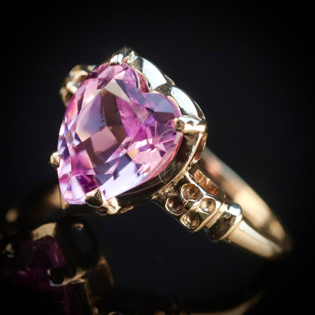 Vintage ring with synthetic pink sapphire heart in yellow gold from Manor Jewels.