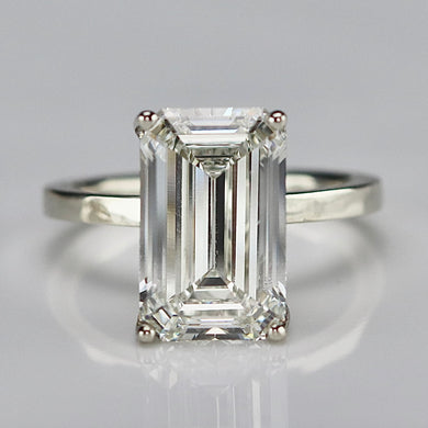 6.03ct emerald cut lab grown solitaire diamond ring in 14k white gold