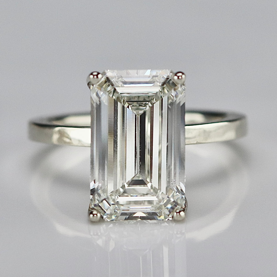 6.03ct emerald cut lab grown solitaire diamond ring in 14k white gold