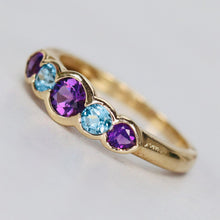 Load image into Gallery viewer, Amethyst and blue topaz band in yellow gold