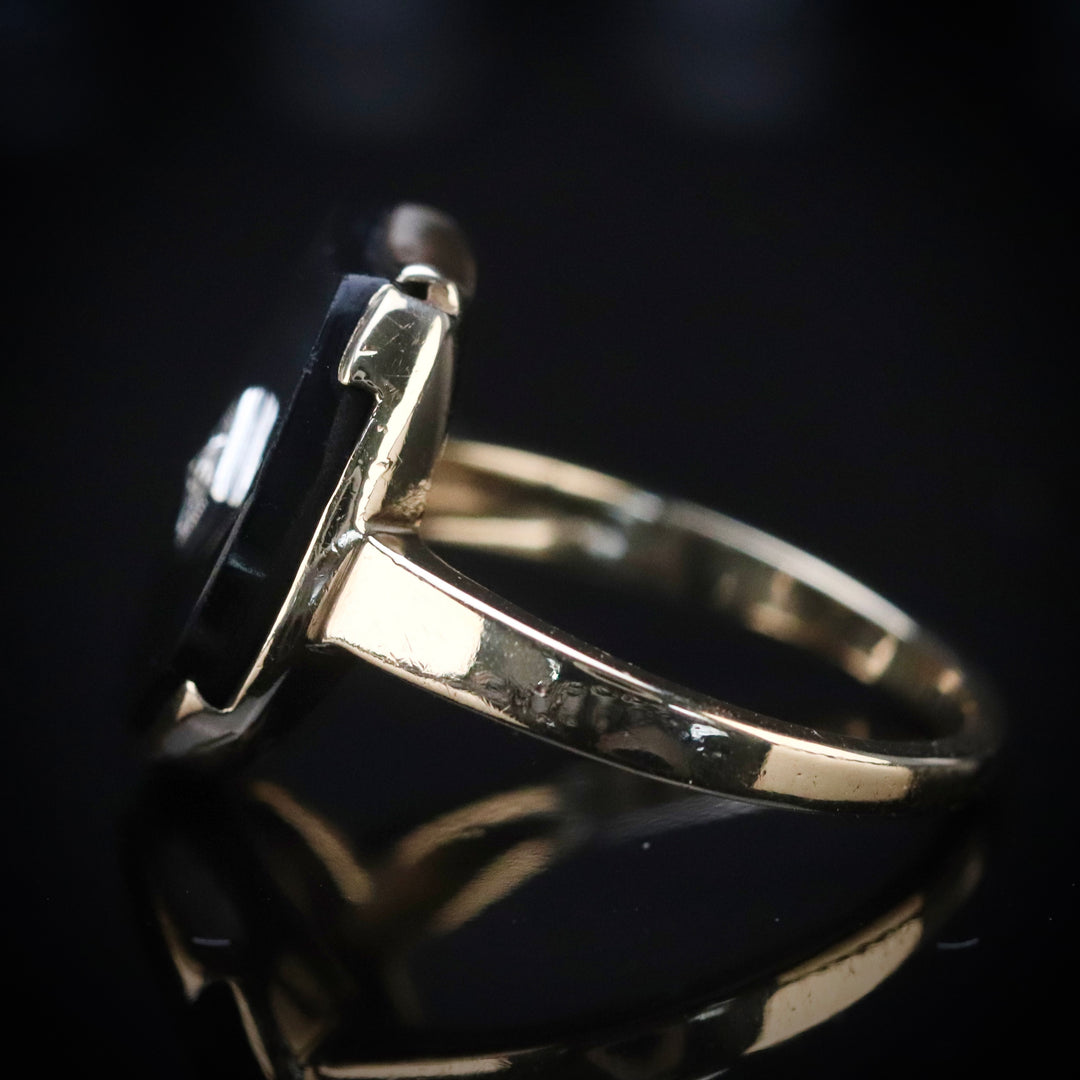 Vintage onyx horseshoe ring in yellow gold from Manor Jewels