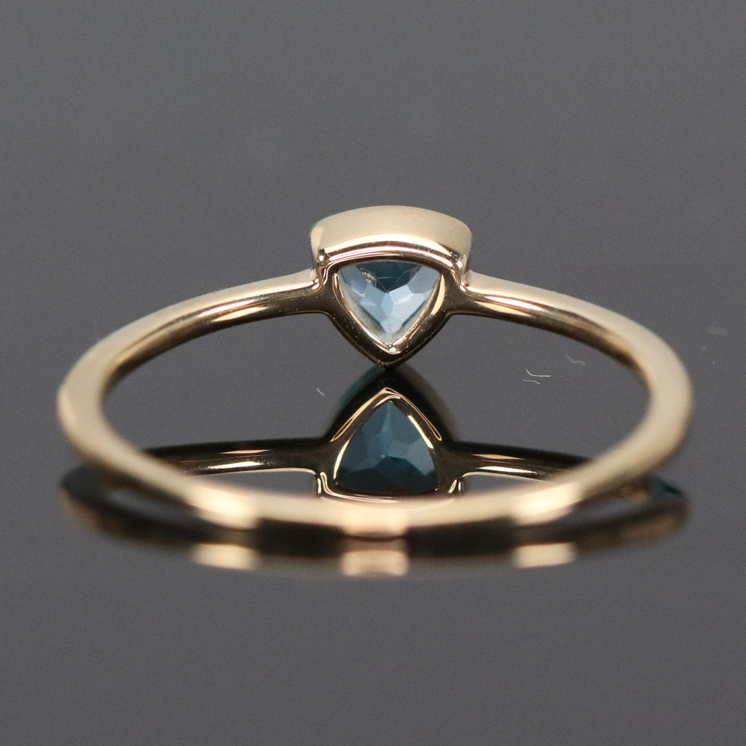 Swiss blue topaz ring in yellow gold