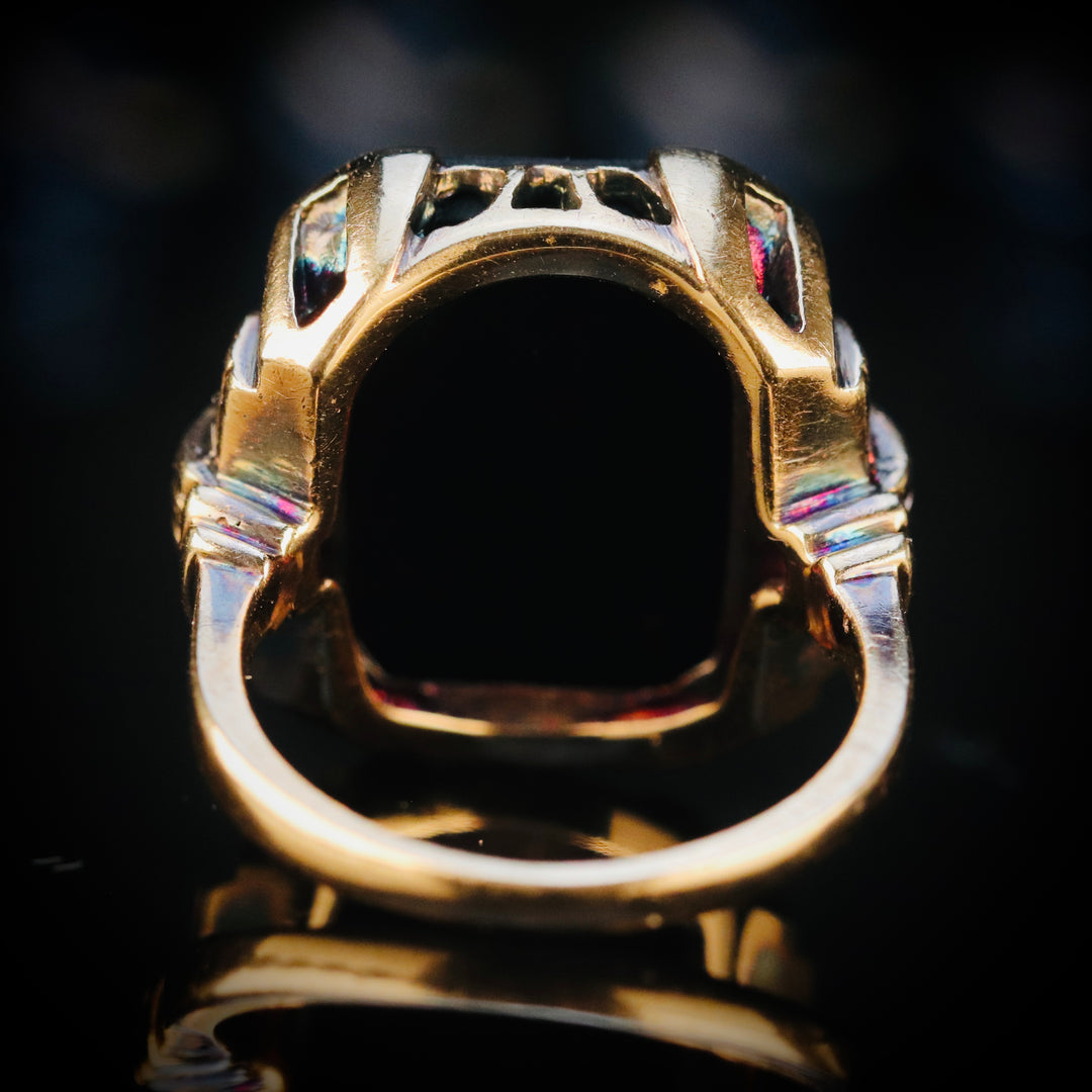 Heavy vintage onyx ring in yellow gold