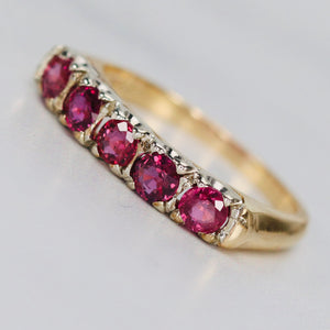 Estate ruby band in 14k yellow and white gold