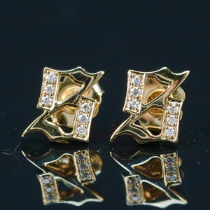 Gothic Letter S diamond studs in 14k yellow gold
