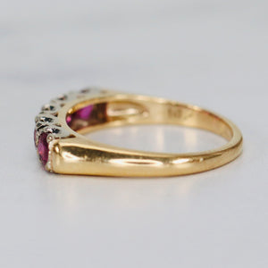 Estate ruby band in 14k yellow and white gold