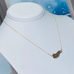 Two tone diamond cut leaf necklace in 14k