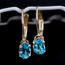 Load image into Gallery viewer, Blue topaz leverback earrings in yellow gold