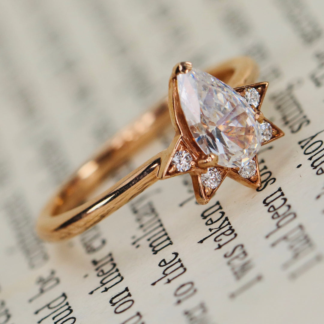 CLEARANCE! Pear shaped CZ and diamond ring in 14k rose gold
