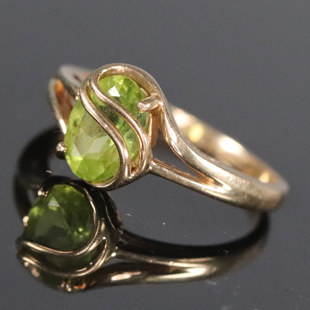 Vintage peridot ring in yellow gold by Manor Jewels