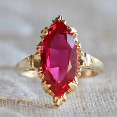 Lab grown Ruby navette ring in 10k yellow gold